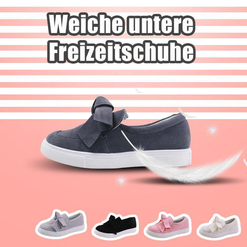 Flache Schuhe der Frauen-Bogen-Segeltuch